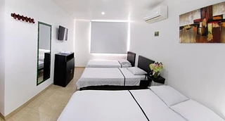 Habitación cuádruple con aire